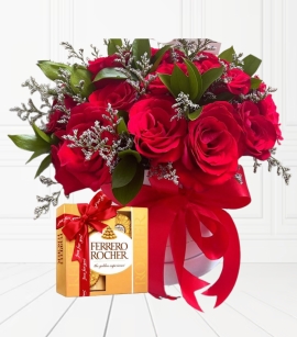Cilindro de rosas rojas y caja de chcolates